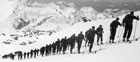 Mountain Shop builds metal-edged skis, ice axes, crampons, backpacks for soldiers in the 10th Mountain Division for WWII.